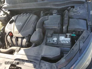 2014 Kia Optima LX z VIN 5XXGM4A78EG280133, wystawiony jako Copart lot #52127405 z przebiegiem 158 369 mil mil oraz Szkoda całkowita • Salvage title. Historia ofert i sprzedaży dostępna na DreamBid. Obrazek 11.