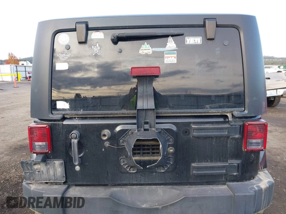 2014 Jeep Wrangler Sahara with VIN 1C4AJWBG5EL247812, listed as a IAAI auction lot 40909884 with 106,475 mi miles and . Bid and sale history available at DreamBid. Image 16.