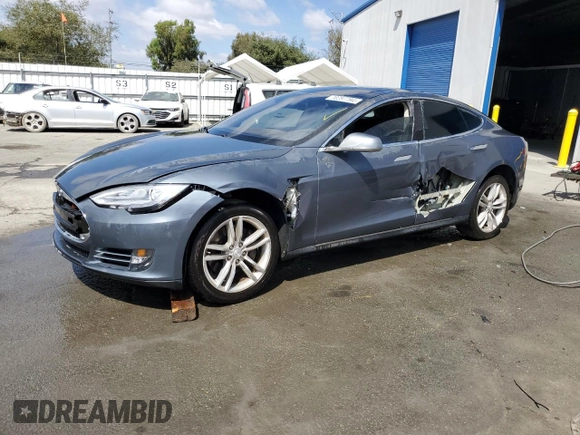 2013 Tesla Model S with VIN 5YJSA1CG9DFP09733, listed as a Copart auction lot 71574474 with 88,163 mi miles and Salvage title. Bid and sale history available at DreamBid. Image 1.