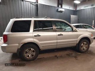 2005 Honda Pilot EX with VIN 5FNYF18465B031034, listed as a IAAI auction lot 41925858 with 194,211 mi miles and . Bid and sale history available at DreamBid. Image 13.