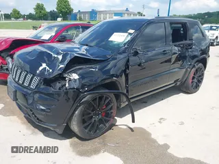 2021 Jeep Grand Cherokee Laredo X with VIN 1C4RJFAG2MC516111, listed as a IAAI auction lot 42222439 with 60,888 mi miles and . Bid and sale history available at DreamBid. Image 2.