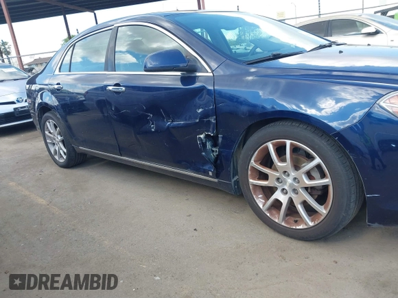 2009 Chevrolet Malibu LTZ with VIN 1G1ZK577594187400, listed as a IAAI auction lot 41889395 with 139,649 mi miles and . Bid and sale history available at DreamBid. Image 14.