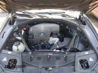 2012 BMW 5 Series 528i with VIN WBAXG5C58CDY28516, listed as a IAAI auction lot 41907803 with 116,499 mi miles. Bid and sale history available at carsss.com. Image 10.