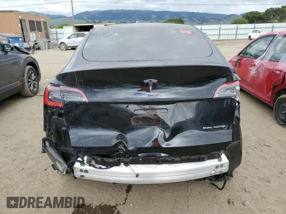 2021 Tesla Model Y Long Range z VIN 5YJYGDEE7MF093942, wystawiony jako Copart lot #54762425 z przebiegiem 20 492 mil mil oraz Szkoda całkowita • Salvage title. Historia ofert i sprzedaży dostępna na DreamBid. Obrazek 6.