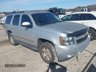 2013 Chevrolet Tahoe LS with VIN 1GNSCAE00DR361459, listed as a IAAI auction lot 41614458 with 171,925 mi miles and . Bid and sale history available at DreamBid. Image 1.
