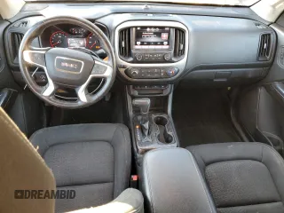 2015 GMC Canyon 4WD SLE with VIN 1GTH6BE37F1133213, listed as a Copart auction lot 82404014 with 142,149 mi miles and Salvage Title. Bid and sale history available at carsss.com. Image 8.