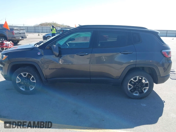 2019 Jeep Compass Trailhawk with VIN 3C4NJDDB0KT619337, listed as a IAAI auction lot 42171160 with 63,869 mi miles and . Bid and sale history available at DreamBid. Image 14.