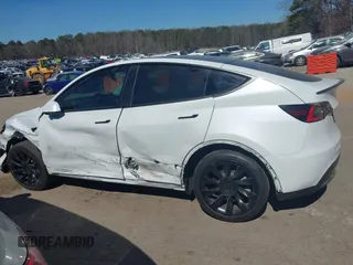 2021 Tesla Model Y Long Range with VIN 5YJYGDEE8MF125104, listed as a IAAI auction lot 41698065 with 25,177 mi miles and . Bid and sale history available at DreamBid. Image 13.