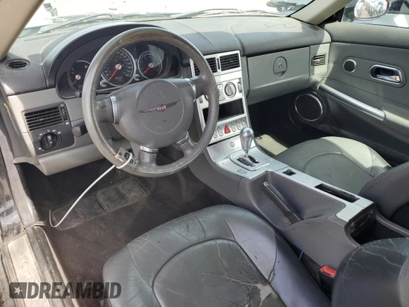 2004 Chrysler Crossfire z VIN 1C3AN69LX4X023972, wystawiony jako Copart lot #49111475 z przebiegiem 208 710 mil mil oraz Szkoda całkowita • Salvage title. Historia ofert i sprzedaży dostępna na DreamBid. Obrazek 8.