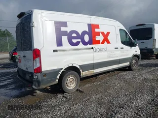 2020 Ford Transit Cargo z VIN 1FTBR1C87LKA51039, wystawiony jako IAAI lot #42212523 z przebiegiem 183 020 mil mil oraz . Historia ofert i sprzedaży dostępna na DreamBid. Obrazek 4.