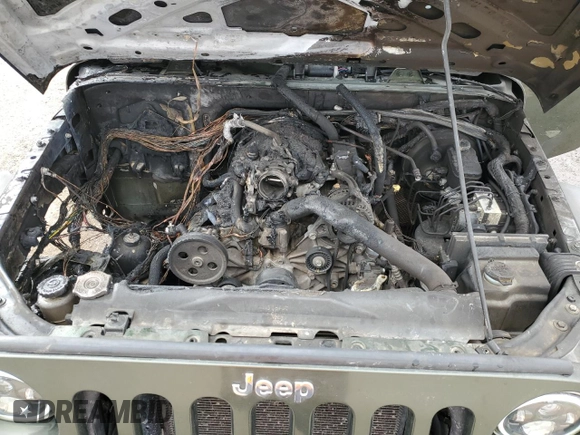 2007 Jeep Wrangler Unlimited X z VIN 1J4GA39197L181305, wystawiony jako Copart lot #45928555 z przebiegiem Nie podano mil oraz Szkoda całkowita • Salvage title. Historia ofert i sprzedaży dostępna na DreamBid. Obrazek 11.