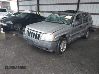 2001 Jeep Grand Cherokee Laredo with VIN 1J4GX48S51C708990, listed as a IAAI auction lot 41656323 with 198,124 mi miles and . Bid and sale history available at DreamBid. Image 2.