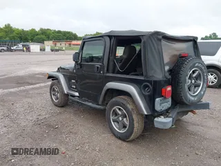 2004 Jeep Wrangler X z VIN 1J4FA39SX4P730504, wystawiony jako IAAI lot #42342491 z przebiegiem 112 942 mil mil oraz . Historia ofert i sprzedaży dostępna na DreamBid. Obrazek 3.