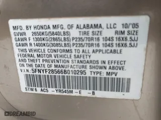 2006 Honda Pilot EX-L with VIN 5FNYF28566B010295, listed as a IAAI auction lot 41654433 with 302,539 mi miles. Bid and sale history available at carsss.com. Image 9.