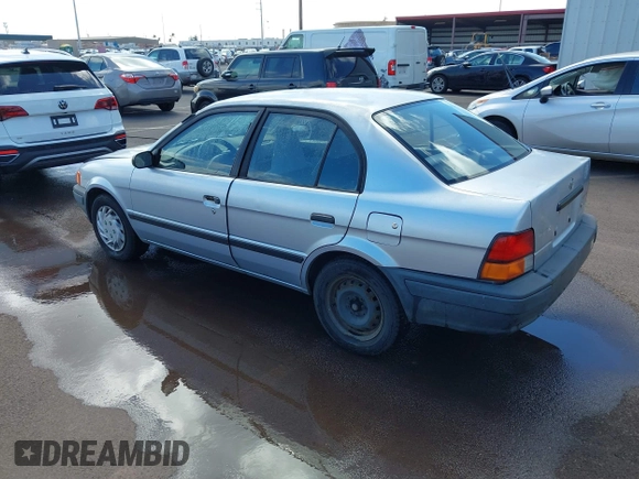 1997 Toyota Tercel DX z VIN JT2BC52L3V0242284, wystawiony jako IAAI lot #41736573 z przebiegiem 65 264 mil mil oraz . Historia ofert i sprzedaży dostępna na DreamBid. Obrazek 3.