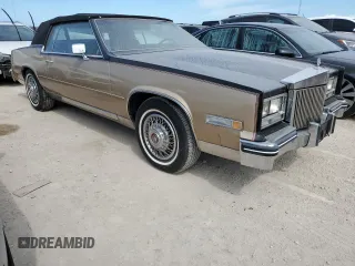 1985 Cadillac Eldorado z VIN 1G6EL578XFE614641, wystawiony jako Copart lot #75663984 z przebiegiem 54 128 mil mil oraz Szkody całkowita. Historia ofert i sprzedaży dostępna na DreamBid. Obrazek 4.