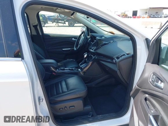2015 Ford Escape Titanium with VIN 1FMCU0JX4FUB07322, listed as a IAAI auction lot 42220345 with 184,852 mi miles and . Bid and sale history available at DreamBid. Image 5.