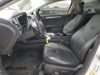 2014 Ford Fusion Titanium with VIN 3FA6P0K97ER393249, listed as a Copart auction lot 53087355 with 148,266 mi miles and Salvage Title. Bid and sale history available at DreamBid. Image 7.