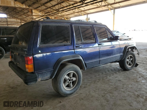 1996 Jeep Cherokee Sport with VIN 1J4FT68S1TL275271, listed as a Copart auction lot 72701214 with 235,651 mi miles and Salvage Title. Bid and sale history available at carsss.com. Image 3.