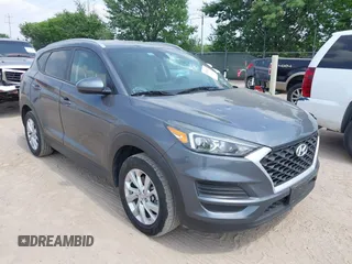 2019 Hyundai Tucson Value z VIN KM8J33A43KU962816, wystawiony jako IAAI lot #41963617 z przebiegiem 112 575 mil mil oraz . Historia ofert i sprzedaży dostępna na DreamBid. Obrazek 1.