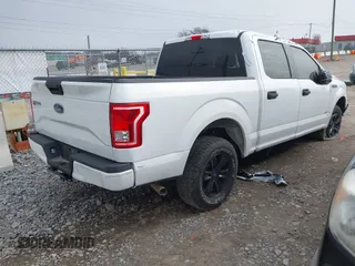 2015 Ford F-150 XL with VIN 1FTEW1CF9FFA40738, listed as a IAAI auction lot 41715885 with 296,111 mi miles. Bid and sale history available at carsss.com. Image 4.