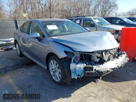 2023 Toyota Camry LE z VIN 4T1C11AK1PU771615, wystawiony jako IAAI lot #41679085 z przebiegiem 20 230 mil mil oraz . Historia ofert i sprzedaży dostępna na DreamBid. Obrazek 1.