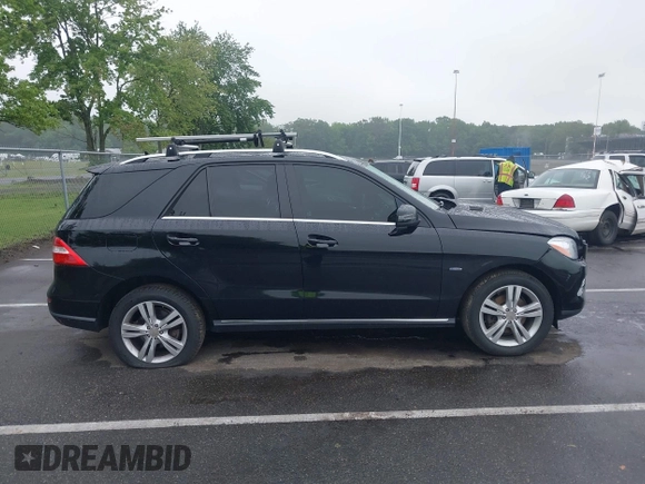 2012 Mercedes-Benz M 350 with VIN 4JGDA5HB7CA001805, listed as a IAAI auction lot 42450008 with 112,020 mi miles and . Bid and sale history available at DreamBid. Image 13.
