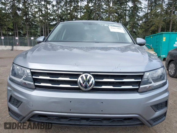 2021 Volkswagen Tiguan SE with VIN 3VV3B7AX0MM008809, listed as a IAAI auction lot 42077986 with 70,780 mi miles and . Bid and sale history available at DreamBid. Image 12.