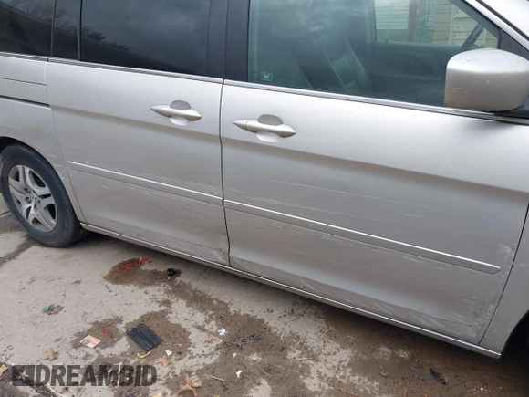 2006 Honda Odyssey EX-L with VIN 5FNRL38656B401515, listed as a IAAI auction lot 40887899 with 241,327 mi miles. Bid and sale history available at carsss.com. Image 20.