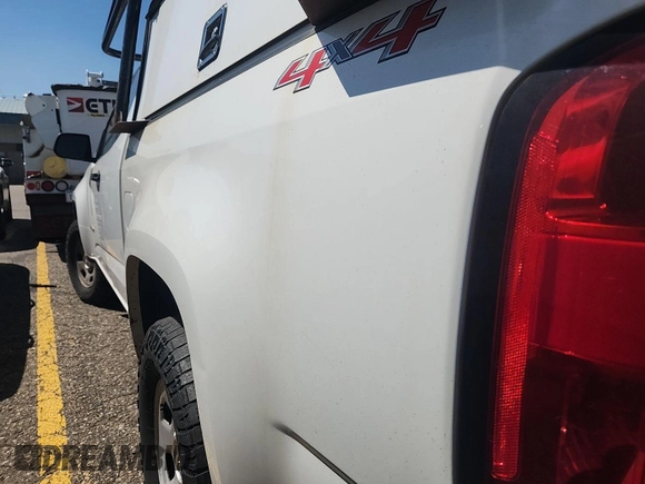 2015 Chevrolet Colorado 4WD WT с VIN 1GCHTAE36F1186486, выставлен на аукционе IAAI как лот 42587686 с пробегом 142 047 миль миль и . История ставок и продаж доступна на DreamBid. Изображение 19.