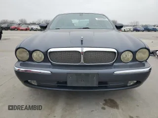 2004 Jaguar XJ with VIN SAJWA71C04SG22878, listed as a Copart auction lot 44383205 with 127,515 mi miles and Clean Title. Bid and sale history available at carsss.com. Image 5.