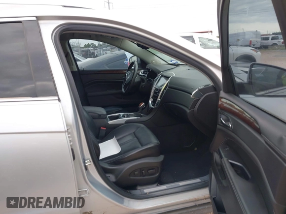 2015 Cadillac SRX Luxury Collection with VIN 3GYFNBE39FS535642, listed as a IAAI auction lot 41939207 with 109,842 mi miles. Bid and sale history available at carsss.com. Image 5.