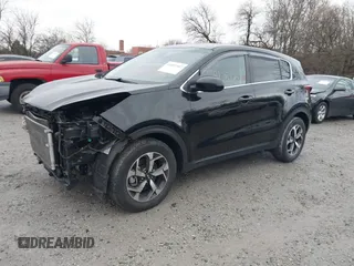 2020 Kia Sportage LX with VIN KNDPM3AC2L7784884, listed as a IAAI auction lot 41037307 with 46,030 mi miles and . Bid and sale history available at DreamBid. Image 2.