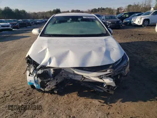 2021 Toyota Corolla Hybrid LE with VIN JTDEAMDE5MJ011169, listed as a Copart auction lot 88752265 with 52,994 mi miles and Salvage Title. Bid and sale history available at carsss.com. Image 5.
