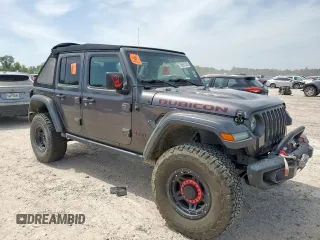 2018 Jeep Wrangler Unlimited Rubicon with VIN 1C4HJXFG6JW166731, listed as a Copart auction lot 56997385 with 117,713 mi miles and Salvage title. Bid and sale history available at DreamBid. Image 4.