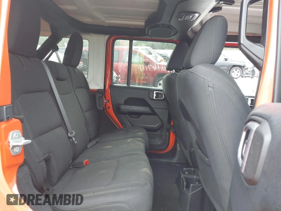 2019 Jeep Wrangler Unlimited Sahara with VIN 1C4HJXEGXKW579982, listed as a IAAI auction lot 42167111 with 98,243 mi miles and . Bid and sale history available at DreamBid. Image 8.