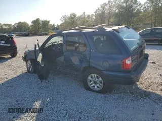 2002 Isuzu Rodeo S with VIN 4S2CK58W124307433, listed as a Copart auction lot 75447074 with 129,163 mi miles and Salvage title. Bid and sale history available at DreamBid. Image 2.