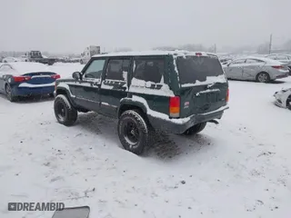 2001 Jeep Cherokee Sport with VIN 1J4FF48S31L625623, listed as a IAAI auction lot 41249234 with 99,954 mi miles. Bid and sale history available at carsss.com. Image 3.