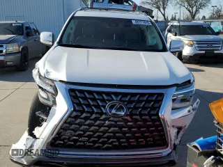 2023 Lexus GX with VIN JTJAM7BX4P5355081, listed as a Copart auction lot 48771915 with 24,000 mi miles and Salvage Title. Bid and sale history available at carsss.com. Image 5.