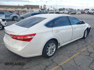 2015 Toyota Avalon Limited with VIN 4T1BK1EB0FU158712, listed as a IAAI auction lot 41436341 with 127,752 mi miles and . Bid and sale history available at DreamBid. Image 4.