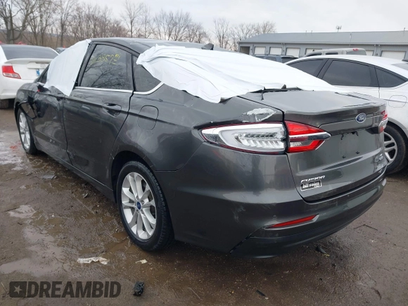2020 Ford Fusion SE z VIN 3FA6P0LU6LR185721, wystawiony jako IAAI lot #41639827 z przebiegiem 63 857 mil mil oraz . Historia ofert i sprzedaży dostępna na DreamBid. Obrazek 3.