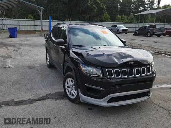 2019 Jeep Compass Sport z VIN 3C4NJCAB8KT615860, wystawiony jako Copart lot #60784545 z przebiegiem 109 592 mil mil oraz Szkoda całkowita • Salvage title. Historia ofert i sprzedaży dostępna na DreamBid. Obrazek 14.