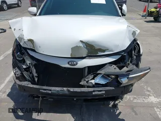 2013 Kia Optima SX with VIN 5XXGR4A6XDG106409, listed as a IAAI auction lot 42525630 with 213,722 mi miles and . Bid and sale history available at DreamBid. Image 6.