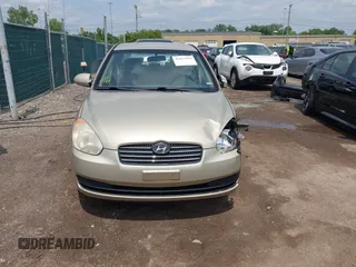 2006 Hyundai Accent GLS with VIN KMHCN46C26U037605, listed as a IAAI auction lot 42431996 with 86,128 mi miles and . Bid and sale history available at DreamBid. Image 12.