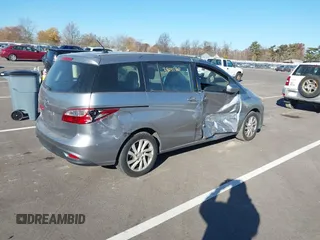 2012 Mazda 5 Sport z VIN JM1CW2BL0C0102448, wystawiony jako IAAI lot #38035360 z przebiegiem 119 438 mil mil oraz . Historia ofert i sprzedaży dostępna na DreamBid. Obrazek 4.