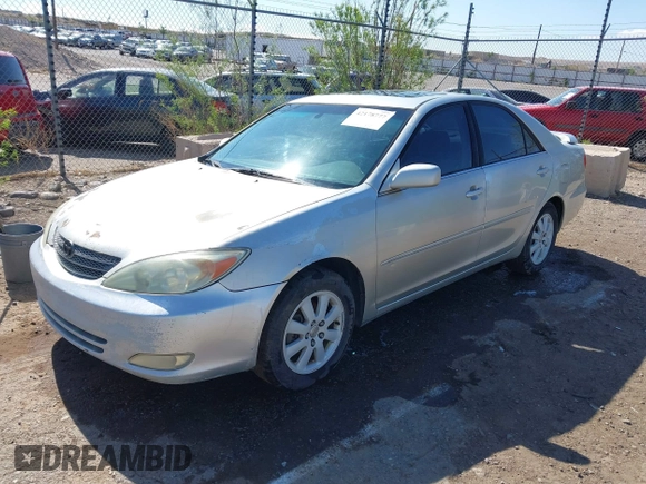2003 Toyota Camry LE with VIN 4T1BE30K63U769219, listed as a IAAI auction lot 42178777 with 293,769 mi miles and . Bid and sale history available at DreamBid. Image 2.
