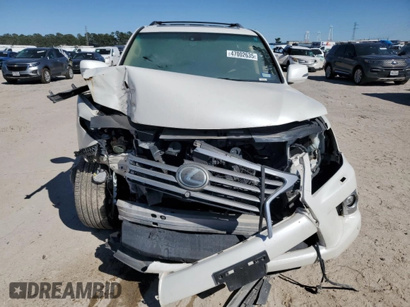 2015 Lexus LX 570 z VIN JTJHY7AX8F4180648, wystawiony jako Copart lot #47002635 z przebiegiem Nie podano mil oraz Szkoda całkowita • Salvage title. Historia ofert i sprzedaży dostępna na DreamBid. Obrazek 5.