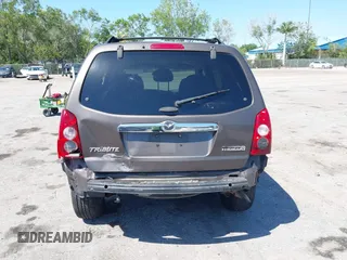 2006 Mazda Tribute i with VIN 4F2YZ02Z36KM29148, listed as a IAAI auction lot 42044163 with 175,786 mi miles and . Bid and sale history available at carsss.com. Image 16.