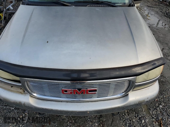 2001 GMC Yukon SLT z VIN 1GKEC13T51J145673, wystawiony jako Copart lot #83568954 z przebiegiem 310 415 mil mil oraz Szkoda całkowita • Salvage title. Historia ofert i sprzedaży dostępna na DreamBid. Obrazek 12.