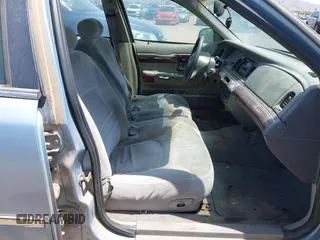 2000 Mercury Grand Marquis LS z VIN 2MEFM75W8YX660478, wystawiony jako IAAI lot #42289748 z przebiegiem 237 860 mil mil oraz . Historia ofert i sprzedaży dostępna na DreamBid. Obrazek 5.